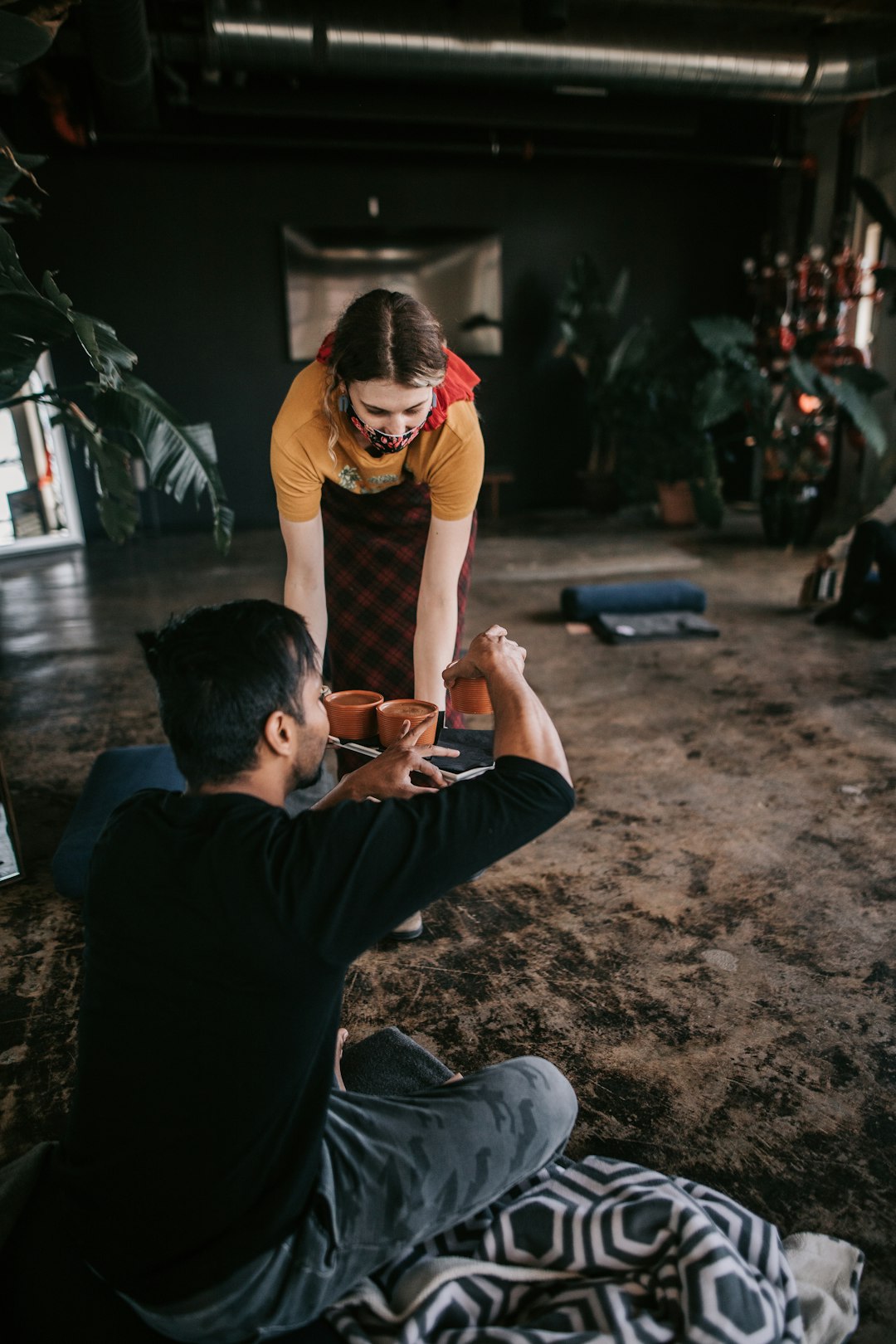 a man and woman sitting outside